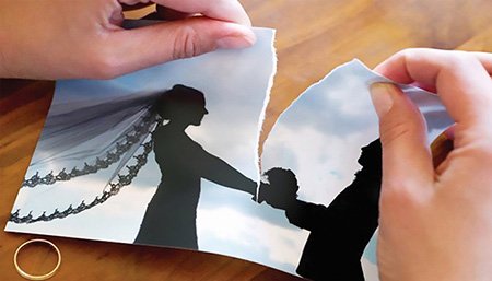 silhouette of a man's head with a glowing light bulb, and gears.